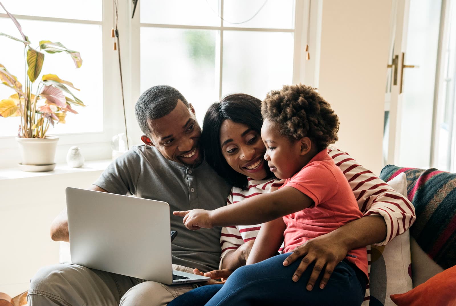 A family sitting together, engaged in conversation